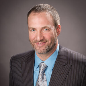 Harmon Zuckerman headshot